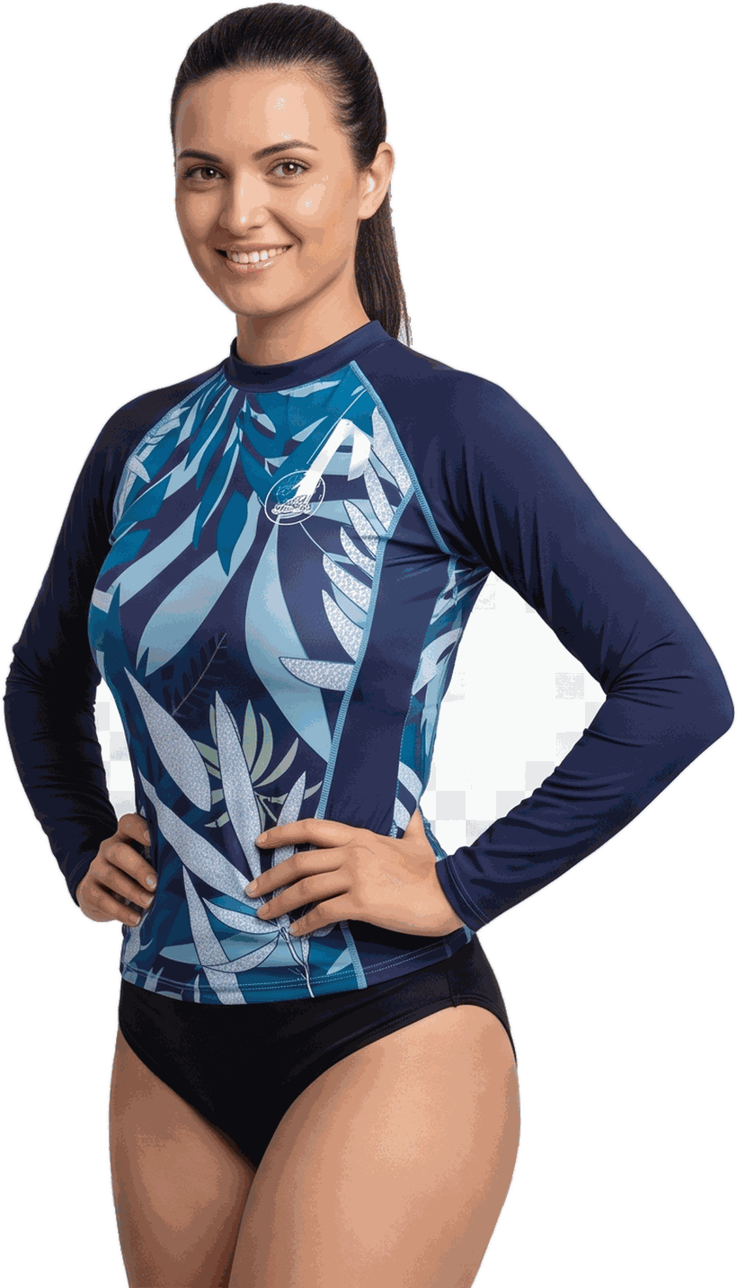 Woman wearing a custom long-sleeve rashguard in navy with a blue leaf sublimation print